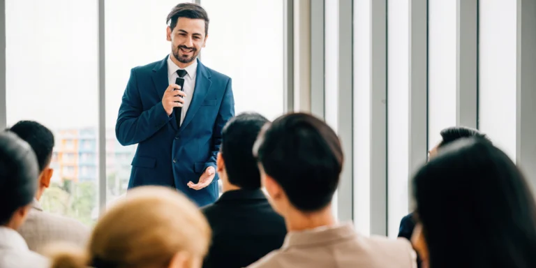 man public speaking confidently